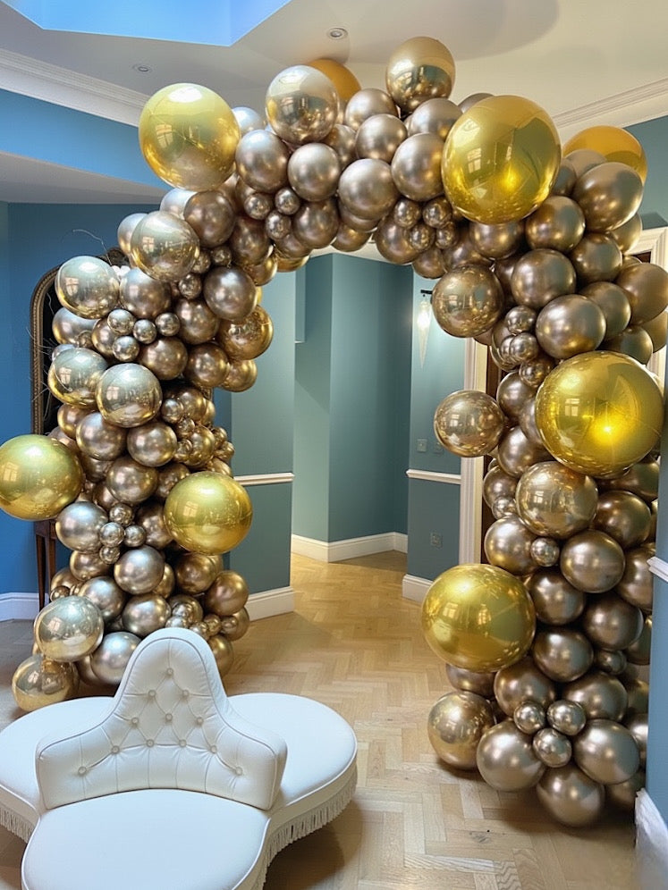 Gold Chrome Balloon Arch with ORBZ – Christmas & Holiday Event Decor